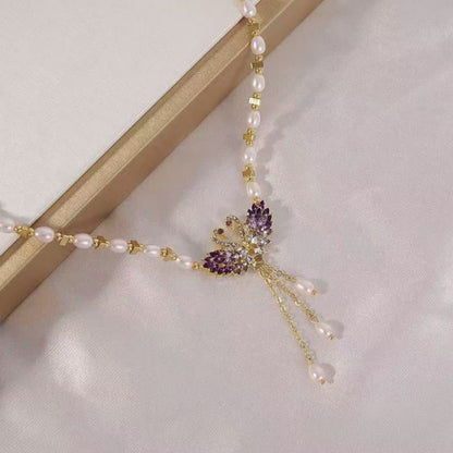 ✨50 % de réduction 🔥 Collier pendentif double cygne violet 🌹
