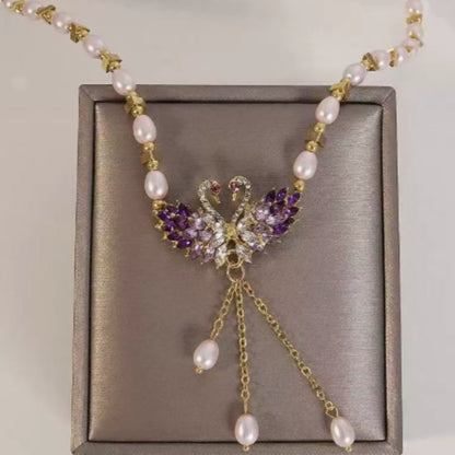 ✨50 % de réduction 🔥 Collier pendentif double cygne violet 🌹