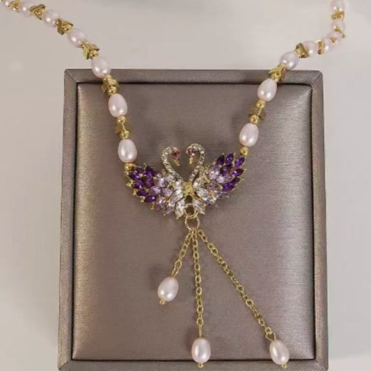 ✨50 % de réduction 🔥 Collier pendentif double cygne violet 🌹