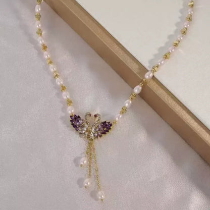 ✨50 % de réduction 🔥 Collier pendentif double cygne violet 🌹