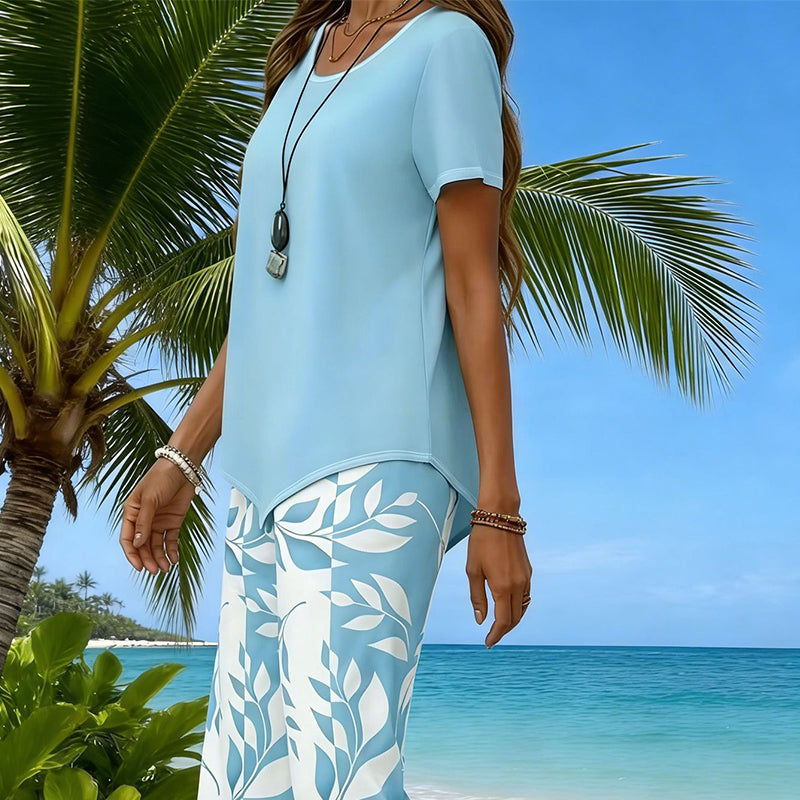 Ensemble 2 pièces haut asymétrique et pantalon capri pour femme