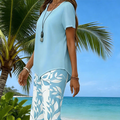Ensemble 2 pièces haut asymétrique et pantalon capri pour femme