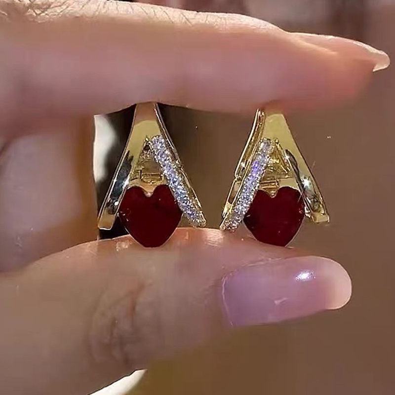Boucles d'oreilles créoles pendantes élégantes en forme de cœur en V