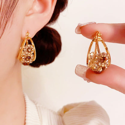 Boucles d'oreilles rondes vintage métalliques au style affirmé