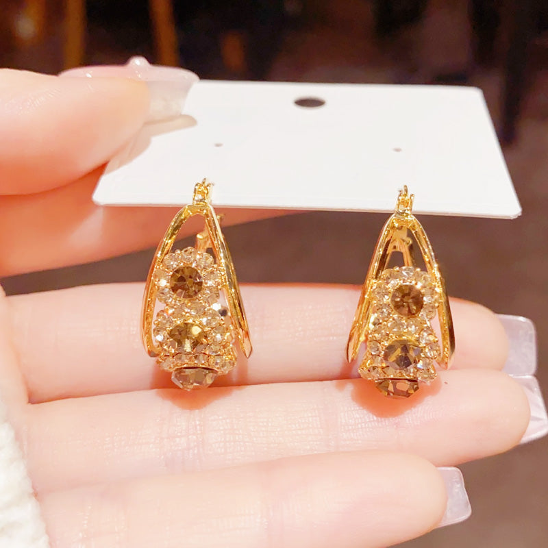 Boucles d'oreilles rondes vintage métalliques au style affirmé