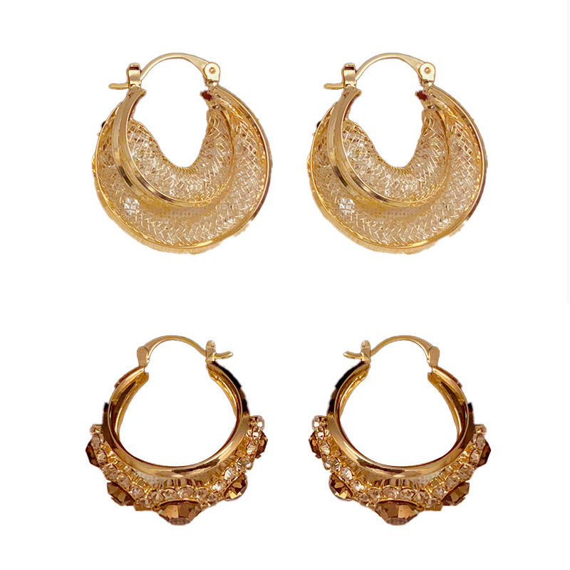 Boucles d'oreilles rondes vintage métalliques au style affirmé